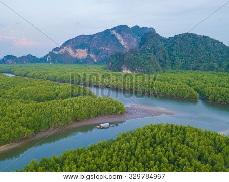 Aerial Top View Of Samet Nangshe, Mountain Valley Hills, And Tropical Green Forest Trees At Sunset W
