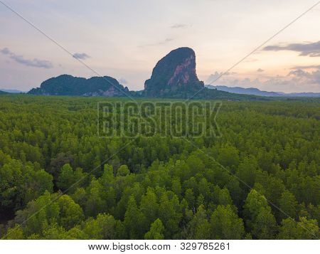 Aerial Top View Of Samet Nangshe, Mountain Valley Hills, And Tropical Green Forest Trees At Sunset W