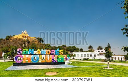 Cholula, Mexico - March 14, 2019: Sign San Andres Cholula And The Church Of Our Lady Of Remedies