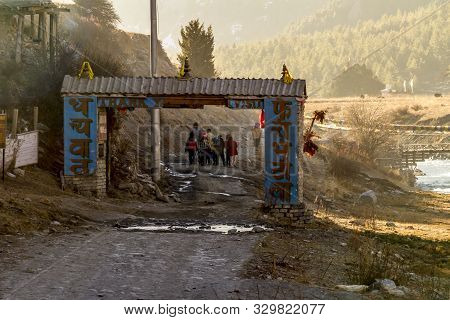 Braga, Nepal - November 11, 2015: Children Going To School In The Early Morning. Street In The Mount