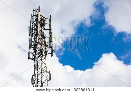A Low Angle View Of A Thick And Generously Equipped Gps Antenna With Satellite Equipment Used In 4g 