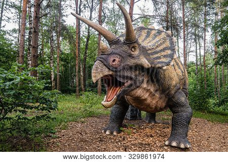 Belgorod, Russia - May 31, 2019: Dinopark Of Belgorod City. Statue Of Triceratops Dinosaur In The Fo