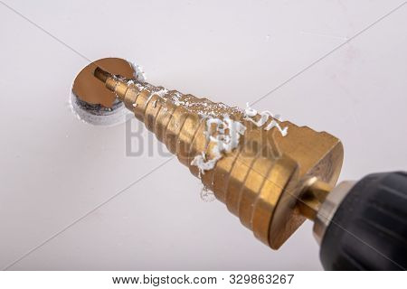 Conical Drill Used For Small Housework. Drilling In Plastic With Tool Steel Drills.