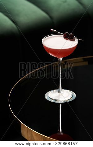 Fresh Cocktail Glass On Glass Table In Night Club Restaurant