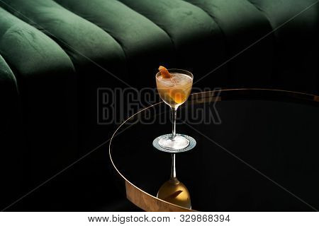 Fresh Cocktail Glass On Glass Table In Night Club Restaurant