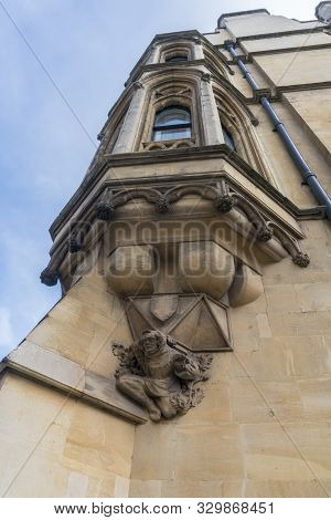 Figurehead Detail At The Base Of A Bay Window