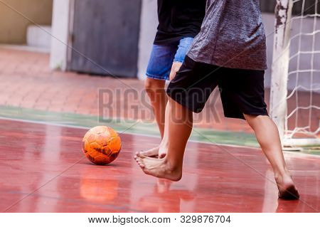 Futsal Players Barefoot. Futsal Player  Control And Shoot Ball To Goal. Soccer Players Fighting Each