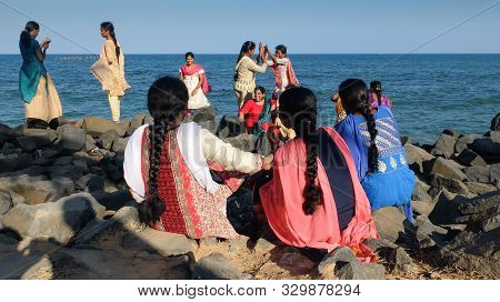 Pondicherry/india-february 23 2018:a Group Of Young Indian Woman In Sarees Have Fun And Hudle Togeth