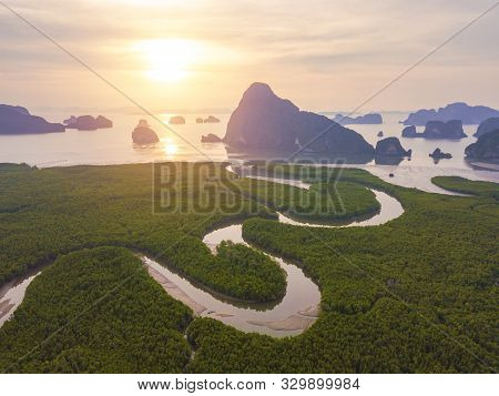 Aerial Top View Of Samet Nangshe, Mountain Valley Hills, And Tropical Green Forest Trees At Sunset W