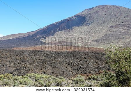 View on the steep coast of Los Gigantes on canary island tenerife with rocks in different colors
