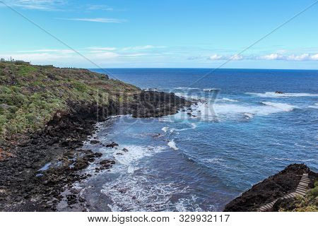 View on the steep coast of Los Gigantes on canary island tenerife with rocks in different colors