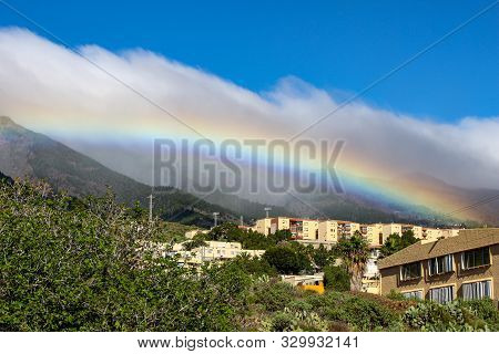 View on the steep coast of Los Gigantes on canary island tenerife with rocks in different colors
