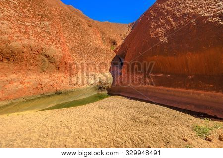 Uluru, Northern Territory, Australia - Aug 24, 2019:mutitjulu Waterhole, Living Cultural Landscape, 