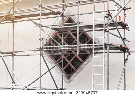 Construction Scaffolding As Temporary Structure For Support Safety In Construction Site For New Buil