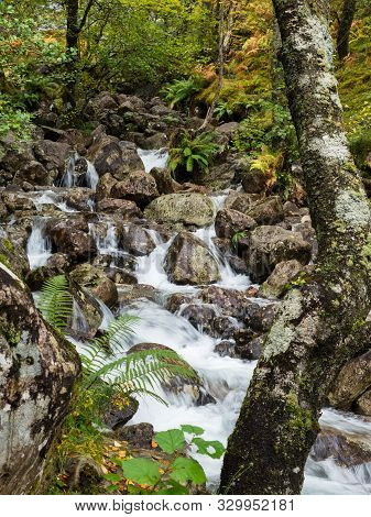 Waterfall In The Valley Of Glen Nevis, Scotland
