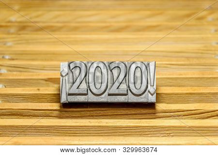 Happy New Year 2020 On Wooden Slats Background With Types Of Press Between Exclamation Marks
