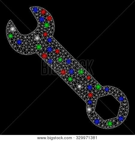 Bright Mesh Wrench With Glare Effect. White Wire Carcass Triangular Network In Vector Format On A Bl