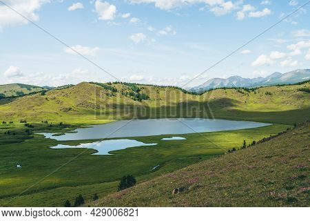 Beautiful Green Mountain Scenery With Lake System On Tableland Among Forest Hills. Scenic Landscape 