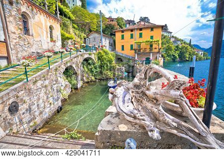 Town Of Nesso Waterfront And Idyllic Harbor  On Como Lake, Lombardy Region Of Italy