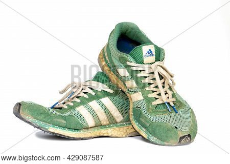 Rayong Thailand, August 8,2021 : Used Of Running Shoes For Exercise Brand Adidas Model Adios Green C