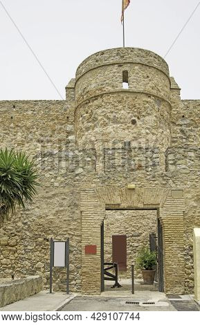 Entrance Gate To The Castle Of Santiago In Sanlucar De Barrameda, Cadiz, Andalusia, Spain. Verticall
