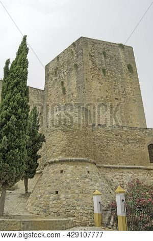 Tower Of The Castillo De Santiago In Sanlucar De Barrameda, Cadiz, Andalusia, Spain. Vertically