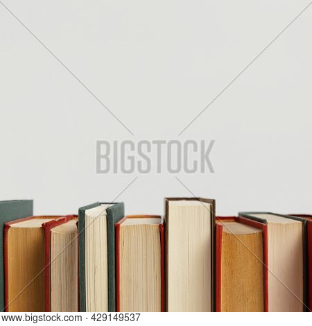 Old Books Arrangement With Copy Space. High Quality Beautiful Photo Concept