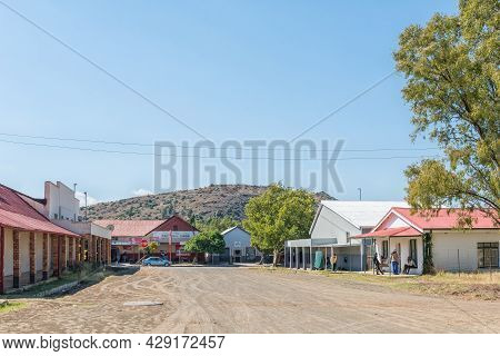 Smithfield, South Africa - April 23, 2021: A Street Scene, With Businesses, People And A Vehicle, In