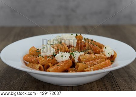 Baked Italian Noodles With Cheese Toppings Fills The Bowl For A Complete Meal.