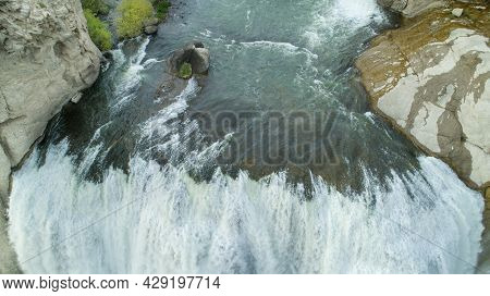 Looking Down A Water Fall From The Snake River