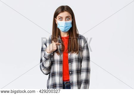 Coronavirus Outbreak, Leisure On Quarantine, Social Distancing And Emotions Concept. Surprised Shock