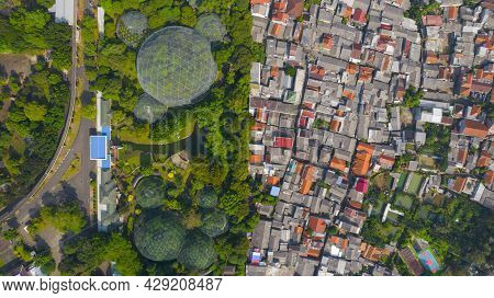 Aerial View Of Taman Mini Indonesia Indah As National Landmark In Indonesia With Noise Cloud. Jakart