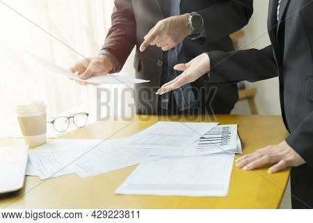 Businessman Reading Documents. Team Job Succes.photo Young Business Managers Working With New Startu