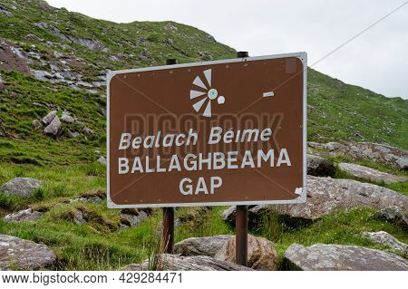 Ballaghbeama Gap, Ireland-  July 9, 2021: The Road Sign At The Top Of Ballaghbeama Gap In The Mounta
