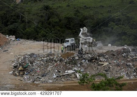 Truck Deposits Garbage In A Landfill In The City Of Salvador
