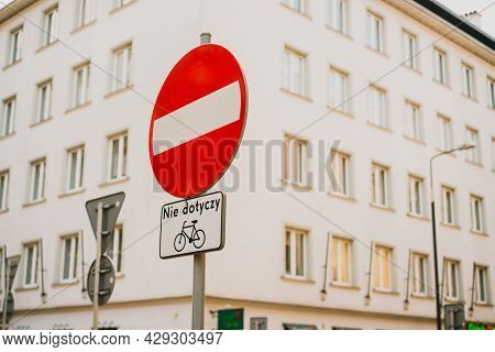 A Stop Sign Saying No Cycling In Polish. Bicycle. Nie Dotyczy. Restricted. Rules. Road. City. Street