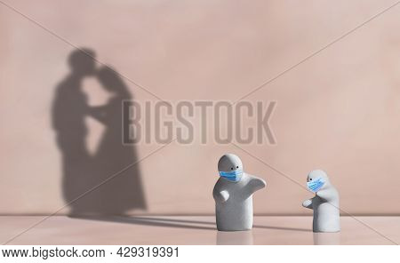 Little 2 Garden Dolls Wearing Protective Mask In Distancing Concern Gesture With Shadow Of Couple Co