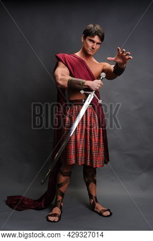 The Sexy Warrior Poses For The Photo.