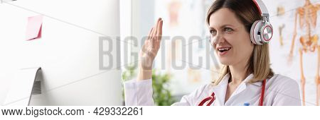 Doctor Operator In Call Center At Work Desk