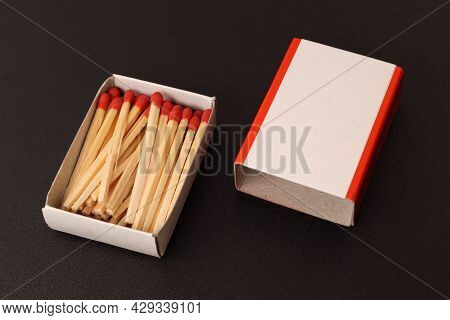 The Matchbox Is Open, The Matches Can Be Seen Along Their Entire Length. Blank White Label On The Ma
