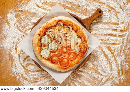 homemade pizz with vegetable and cheese