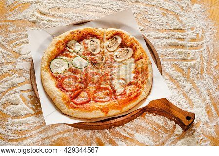 homemade pizz with vegetable and cheese