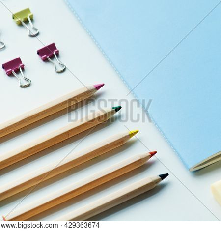 Paper cilp color pencil and notebook
