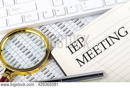 Iep Meeting Text On Notebook With Chart, Magnifier,keyboard And Pen