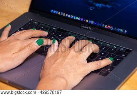 Cyberjaya, Malaysia - October 13, 2020:  Woman Hands Typing On A Computer Keyboard. Female Hands Wri