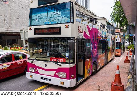 Kuala Lumpur, Malaysia - October 04, 2020: Empty Double Deck Sightseeing Buses On The Streets Of Kua