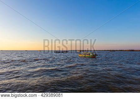Sunset At Tonle Sap Lake, Cambodia, Near The Kampong Phluk Floating Village And Siem Reap. Tourism B