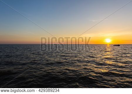 Sunset At Tonle Sap Lake, Cambodia, Near The Kampong Phluk Floating Village And Siem Reap. Tourism B