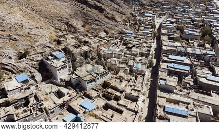 City Of Xigaze At Tibet From The Sky. Aerial View Over A Small Tibetan Village In The Mountain Of Th