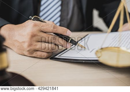Attorney At Work, On The Table There Is A Small Hammer To Beat The Judges Table In Court. And Justic